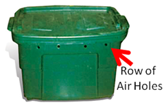 worm bin with a row of air holes along top